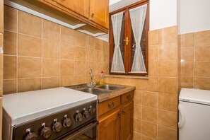Appartement, 2 lits doubles | Blanchisserie