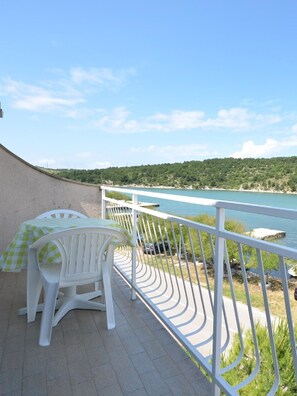 Appartement, plusieurs lits | Balcon
