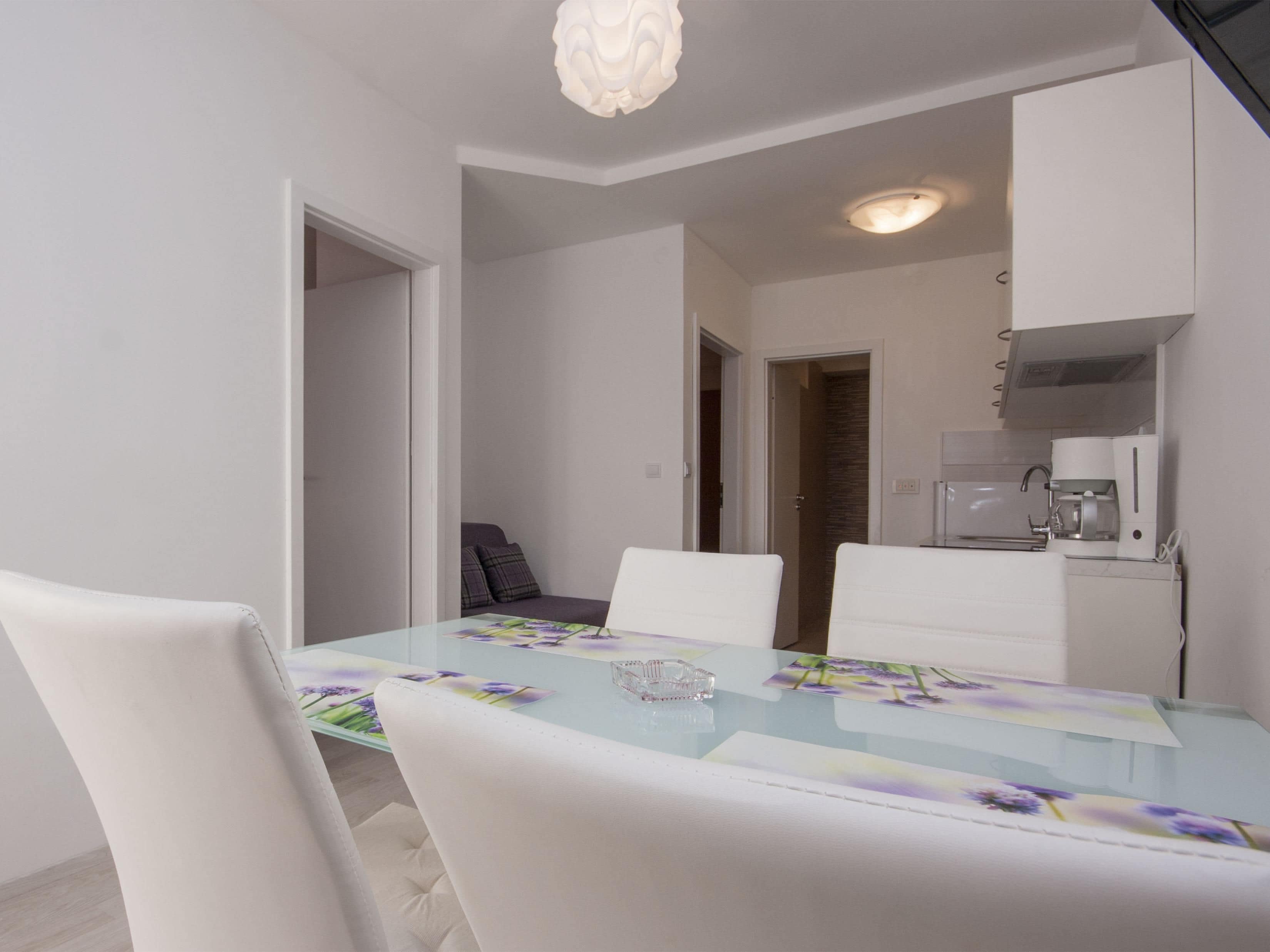 Apartment, Multiple Beds | Private kitchen | Microwave, stovetop, dishwasher, coffee/tea maker