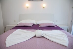 Appartement, Plusieurs lits | Accès au Wi-Fi (inclus), literie fournie