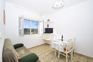 Appartamento, letti multipli | Soggiorno | TV