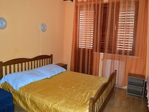 Appartement, Plusieurs lits | Accès au Wi-Fi (inclus), literie fournie