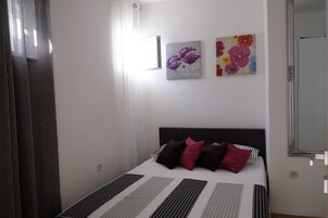 Apartamento, 2 camas de casal | Wi-Fi de cortesia, roupa de cama
