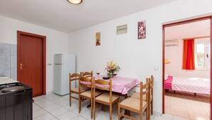 Apartment, Multiple Beds | Private kitchen | Stovetop, cookware/dishes/utensils - Apartments Lucija (Okrug)