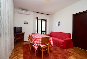Apartment, 2 Double Beds | Living room | TV