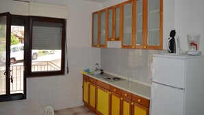 Apartamento, varias camas | Cocina privada | Frigorífico