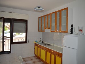 Apartament, diversos llits | Cuina privada | Frigorífic 