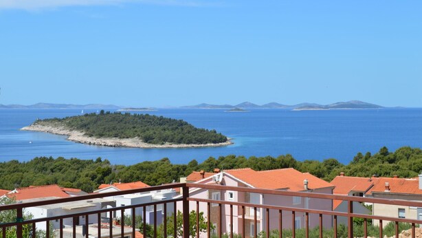 Appartement, Meerdere bedden | Uitzicht op strand/zee