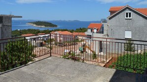 Appartement, Meerdere bedden | Balkon