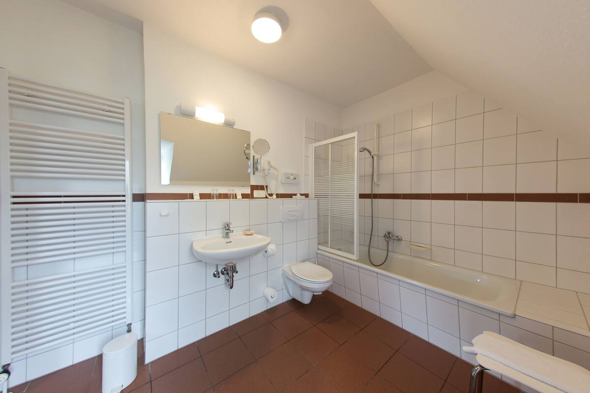 comfort twin room | bathroom | hair dryer, towels