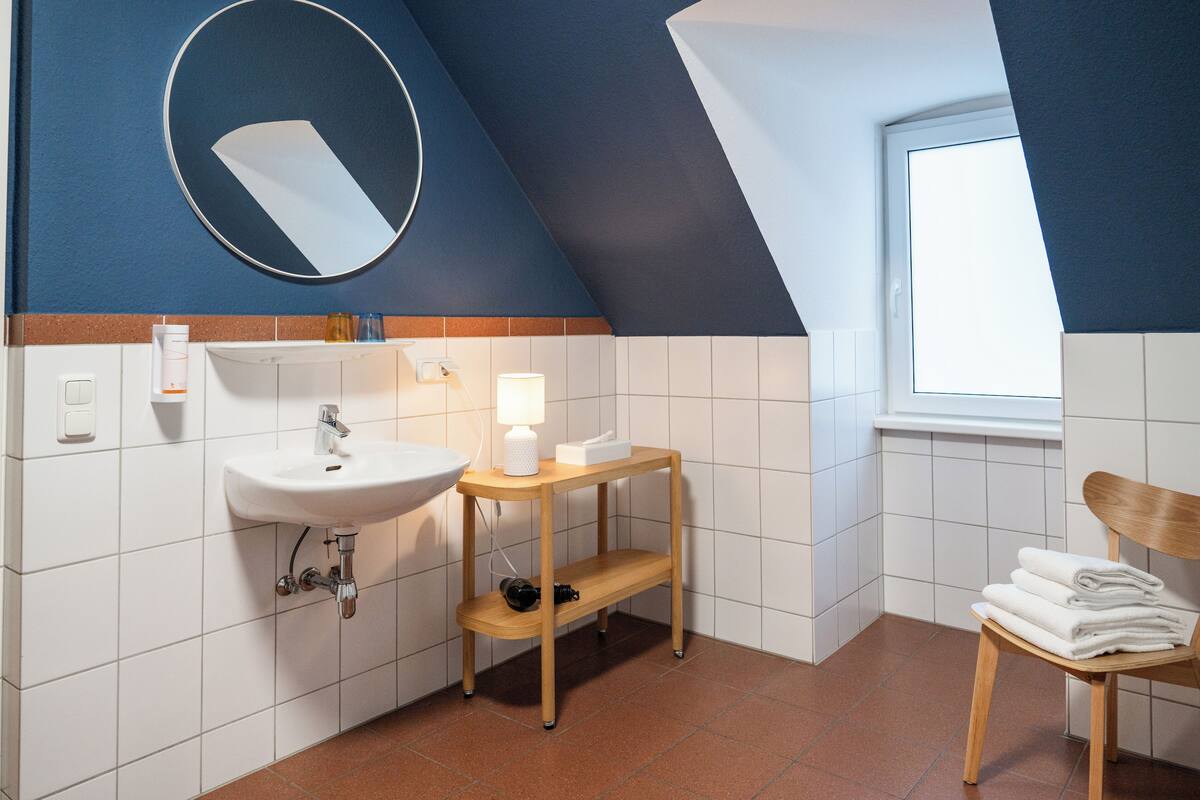 comfort double room | bathroom | hair dryer, towels