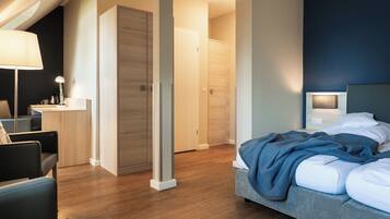 Habitación doble estándar, vista al mar | Ropa de cama hipoalergénica y caja de seguridad en la habitación