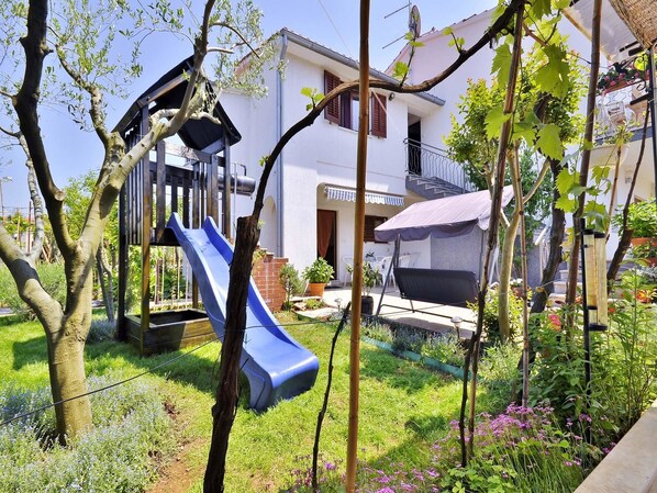 House, Multiple Beds | Children’s play area – outdoor