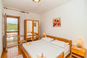 Departamento, 2 camas matrimoniales | Cocina privada | Parrilla de estufa