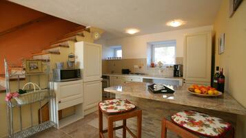 Villa, Multiple Beds | Private kitchen | Stovetop, dishwasher, coffee/tea maker, cookware/dishes/utensils