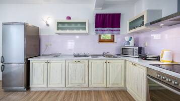 Villa, Multiple Beds | Private kitchen | Stovetop, dishwasher, cookware/dishes/utensils