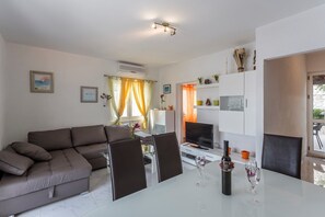 Villa, Multiple Beds | Living room | TV - Villa Desire (Marina)
