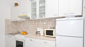 Apartemen, Beberapa Tempat Tidur | Dapur pribadi | Kompor, mesin pencuci piring, dan peralatan masak/sendok-piring