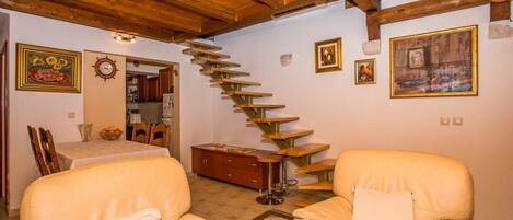 Apartment, Multiple Beds | Living room | TV