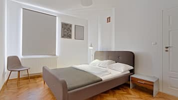 Departamento | Tabla de planchar con plancha, cunas, wifi gratis y ropa de cama