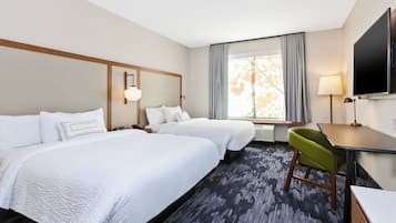 Suite, Multiple Beds | 1 bedroom, down comforters, desk, laptop workspace