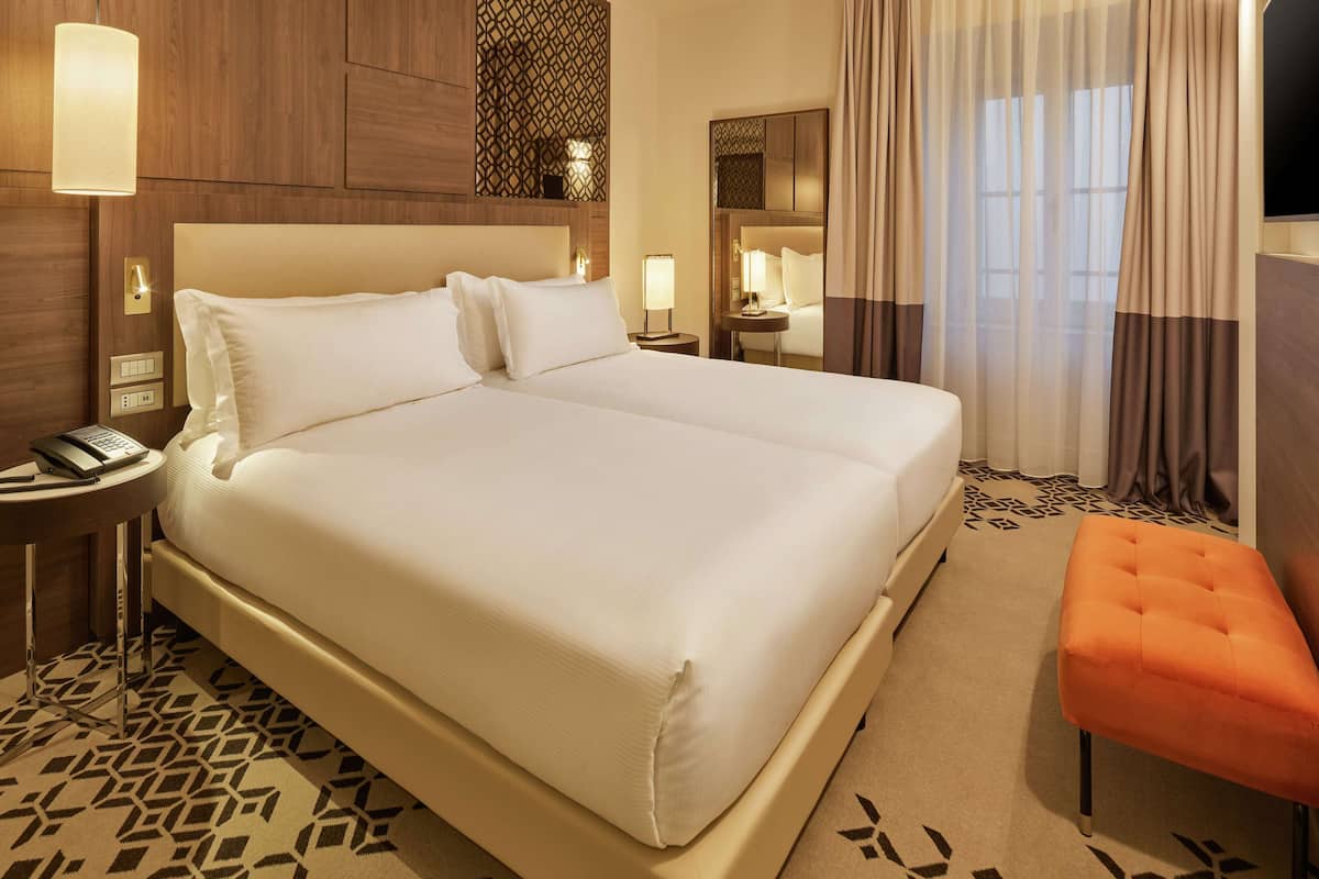 Deluxe Room, Multiple Beds (Family Room) | Minibar, in-room safe, desk, soundproofing
