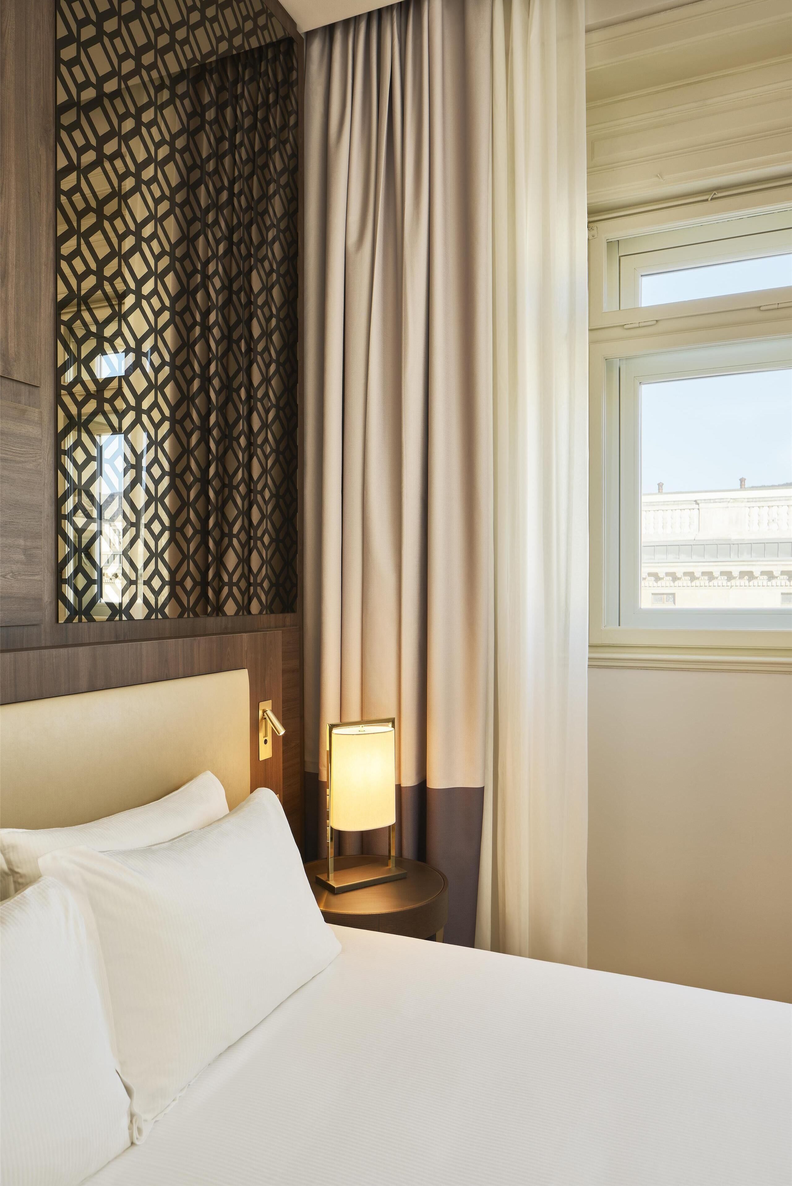 Suite, 1 Bedroom (King Bed, Historical) | Minibar, in-room safe, desk, soundproofing