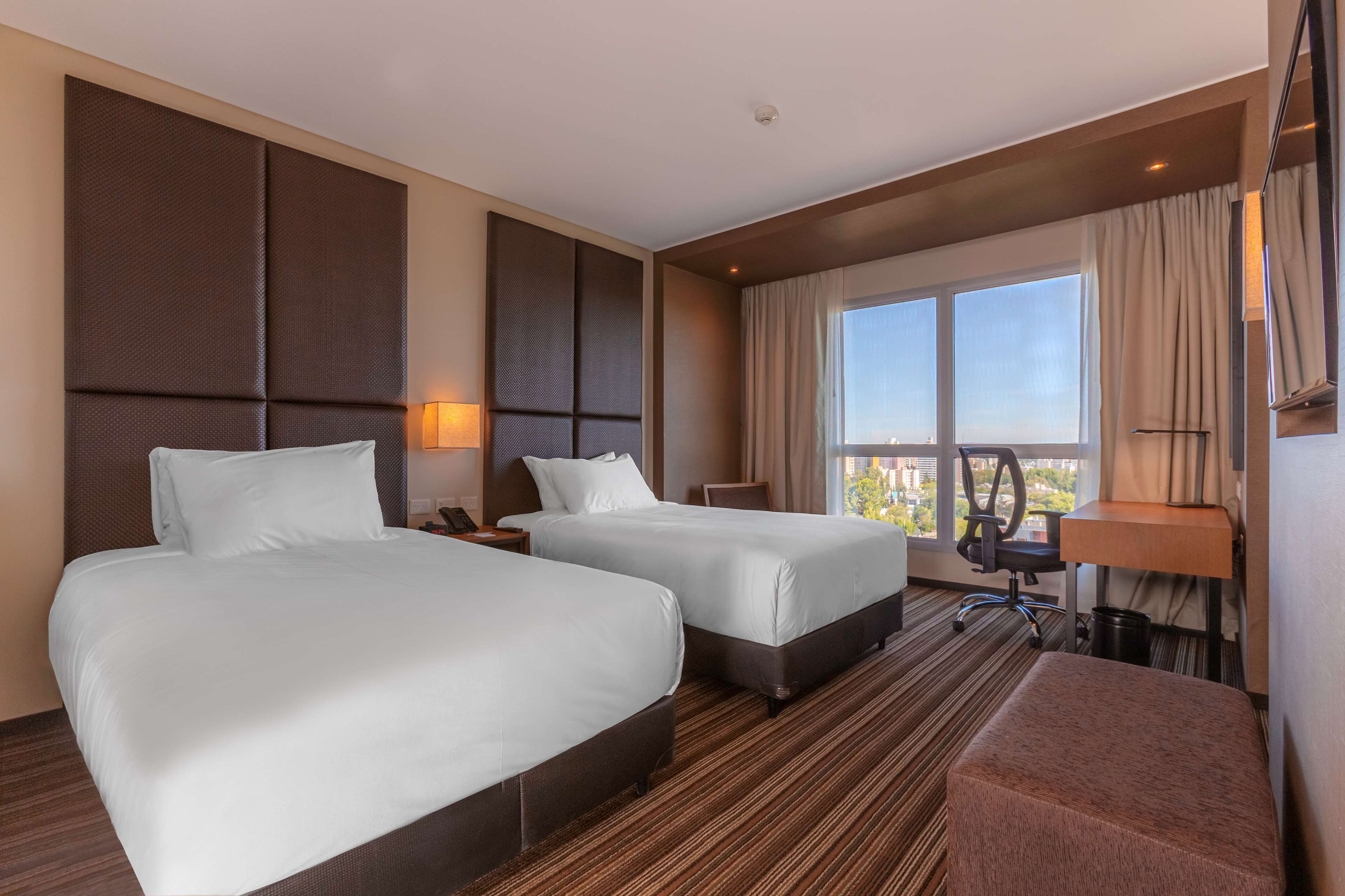 room, 2 single beds, city view | minibar, in-room safe, desk, laptop workspace