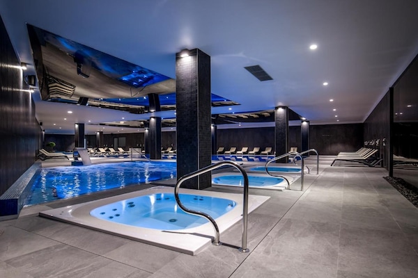 Indoor pool, seasonal outdoor pool, sun loungers