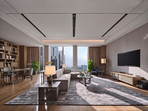 Suite Premium, 1 habitación | Área de sala de estar | Televisión LCD 