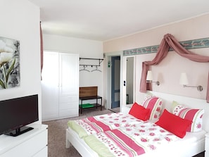 Desk, blackout curtains, free WiFi, bed sheets