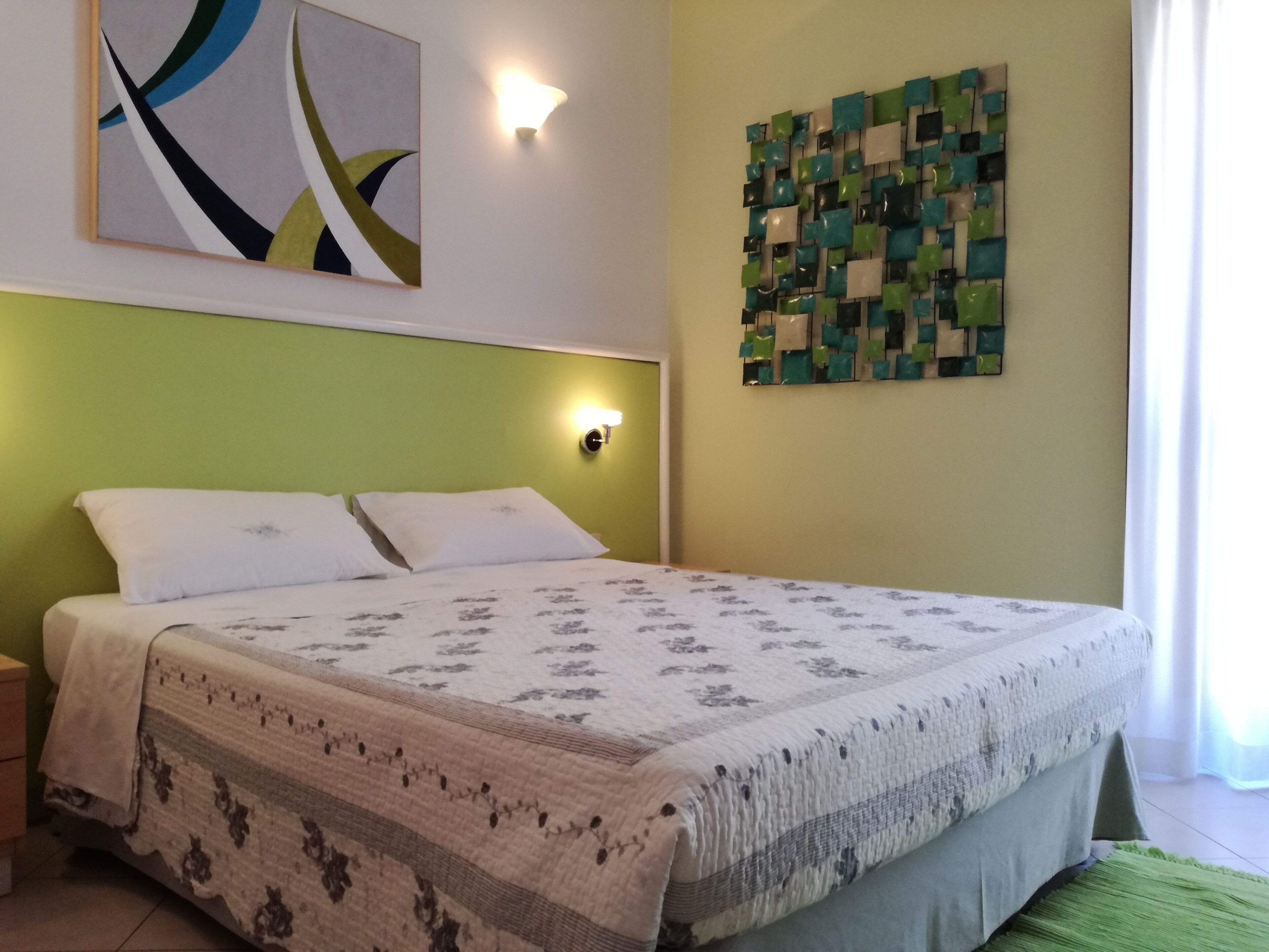 Desk, laptop workspace, free WiFi, bed sheets