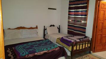 Room, Multiple Beds | Blackout drapes, free cribs/infant beds, free WiFi, bed sheets