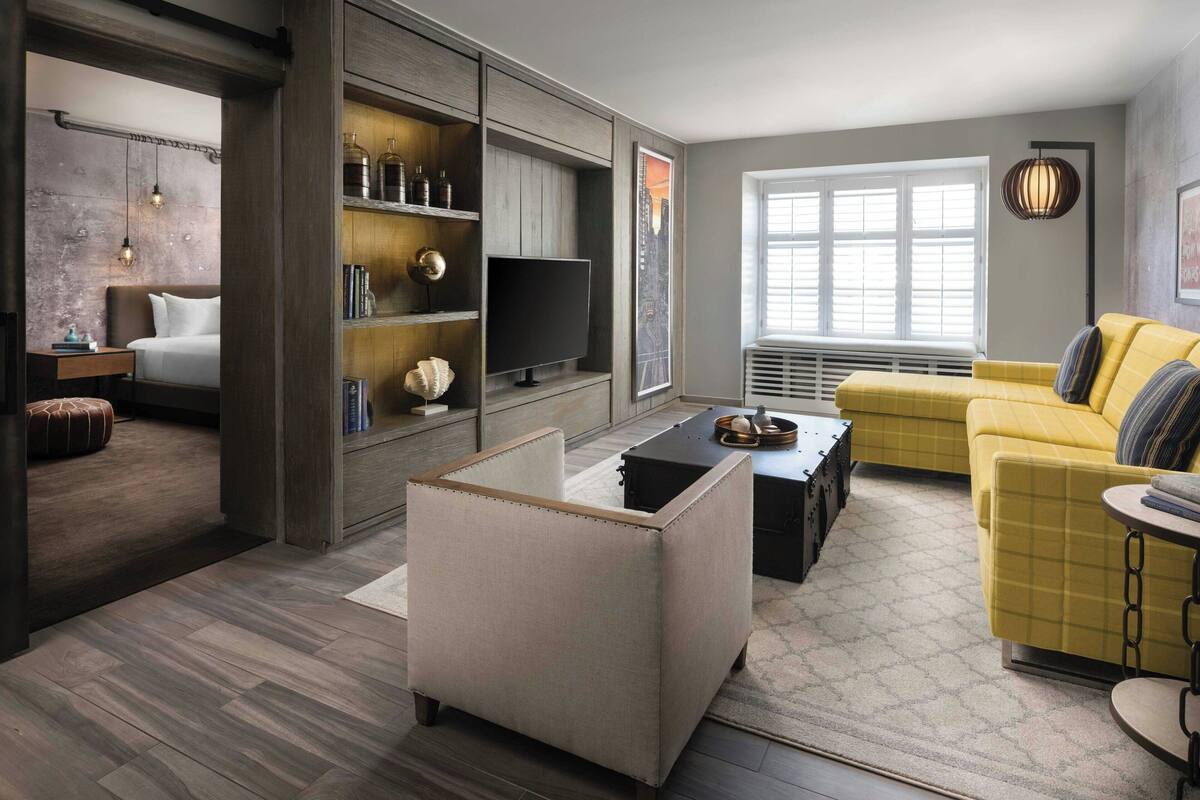 suite, 1 bedroom, courtyard view | living area | led tv