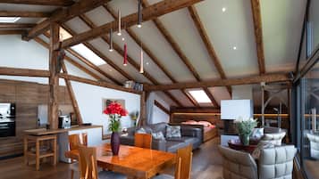 Luxury Penthouse, 2 Bedrooms, Allergy Friendly, Executive Level | Living area | 55-inch Smart TV with satellite channels, TV, fireplace