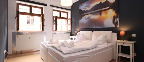 Premium bedding, desk, iron/ironing board, free cots/infant beds