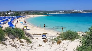 Beach nearby, sun loungers, beach umbrellas