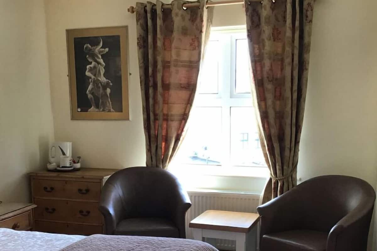 Laptop workspace, blackout drapes, iron/ironing board, WiFi (free)