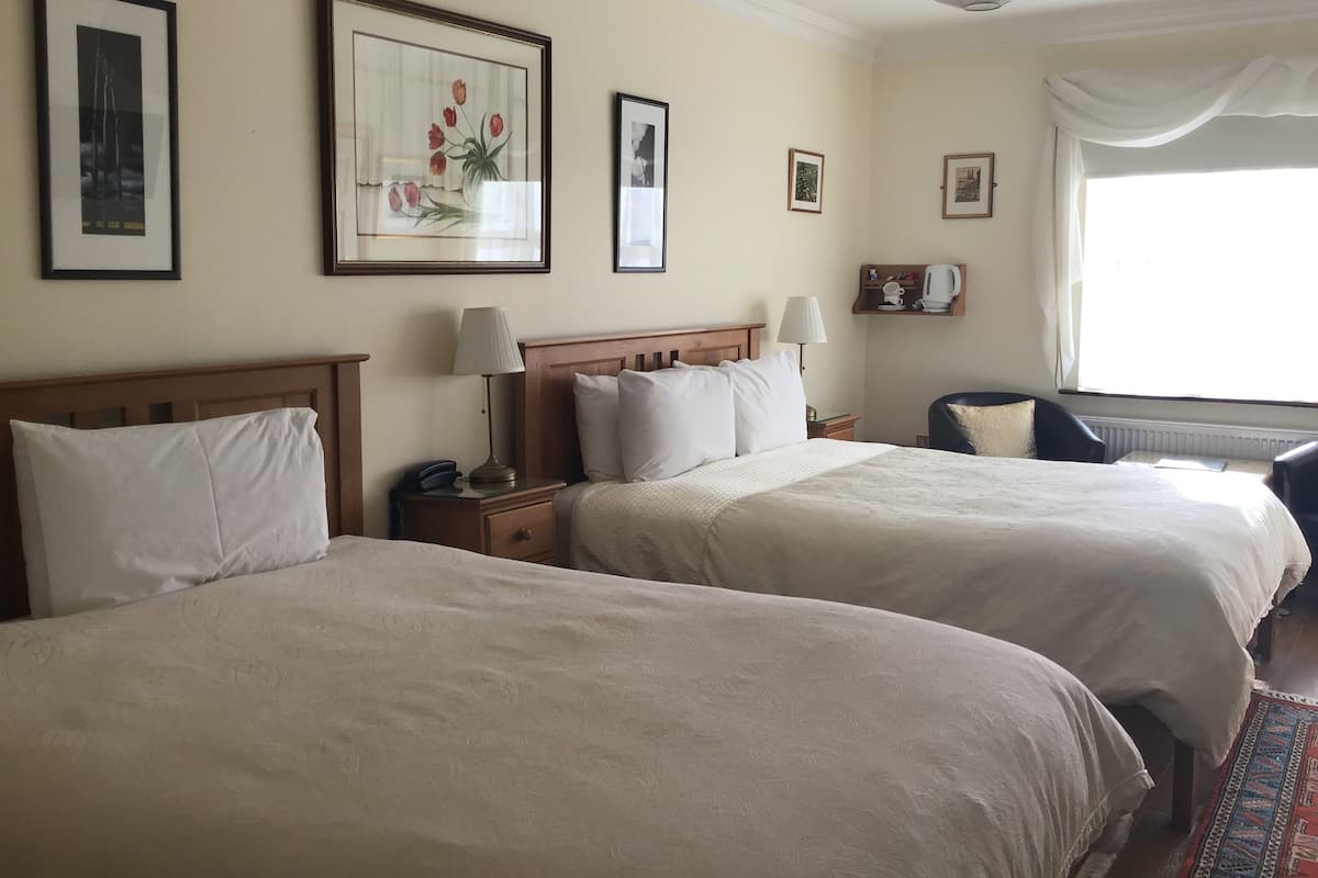 Twin Room | Laptop workspace, blackout drapes, iron/ironing board, WiFi (free)
