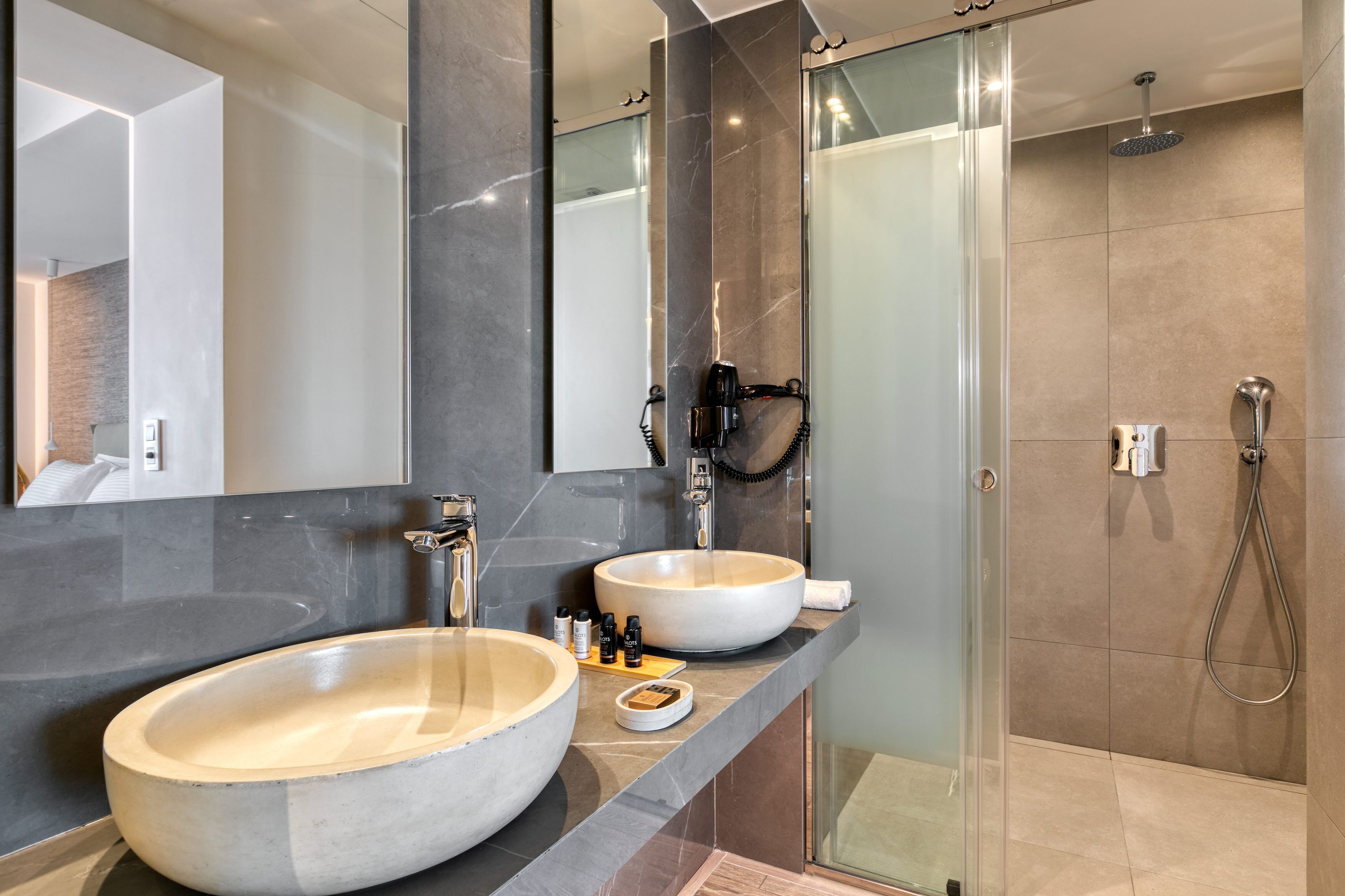suite, sea view | bathroom | shower, hair dryer, slippers, towels