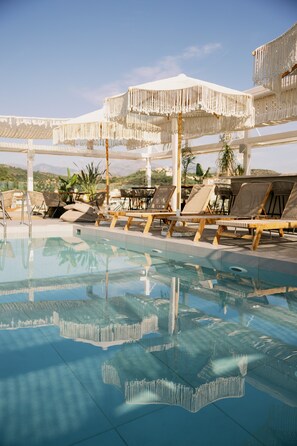 Outdoor pool, open 11:00 AM to 7:00 PM, pool umbrellas, sun loungers - Las Hotel & Spa (East Mani)