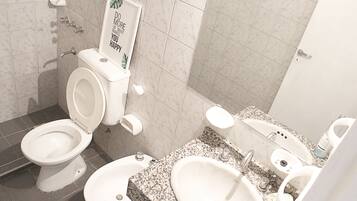 City Apartment, 1 Bedroom | Bathroom | Shower, bidet, soap, shampoo