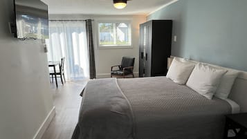 Habitación Deluxe, 1 cama King size | 1 habitación, ropa de cama de alta calidad y cortinas blackout