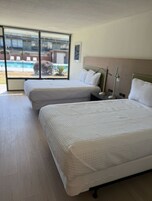 Deluxe Double Room, 2 Double Beds | Premium bedding, individually furnished, free WiFi, bed sheets