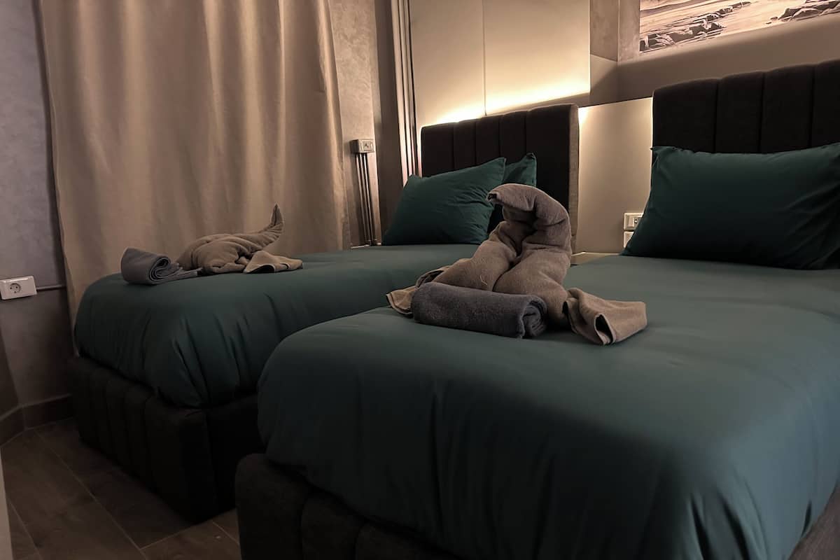 Superior Twin kamer, 1 slaapkamer | Een kluis op de kamer, verduisterende gordijnen, gratis wifi, beddengoed
