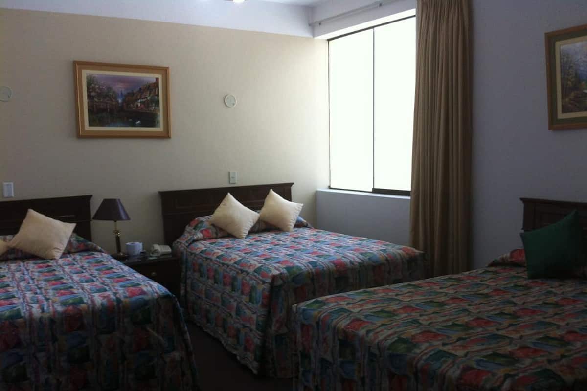Triple Room, Multiple Beds | In-room safe, blackout drapes, iron/ironing board, free WiFi
