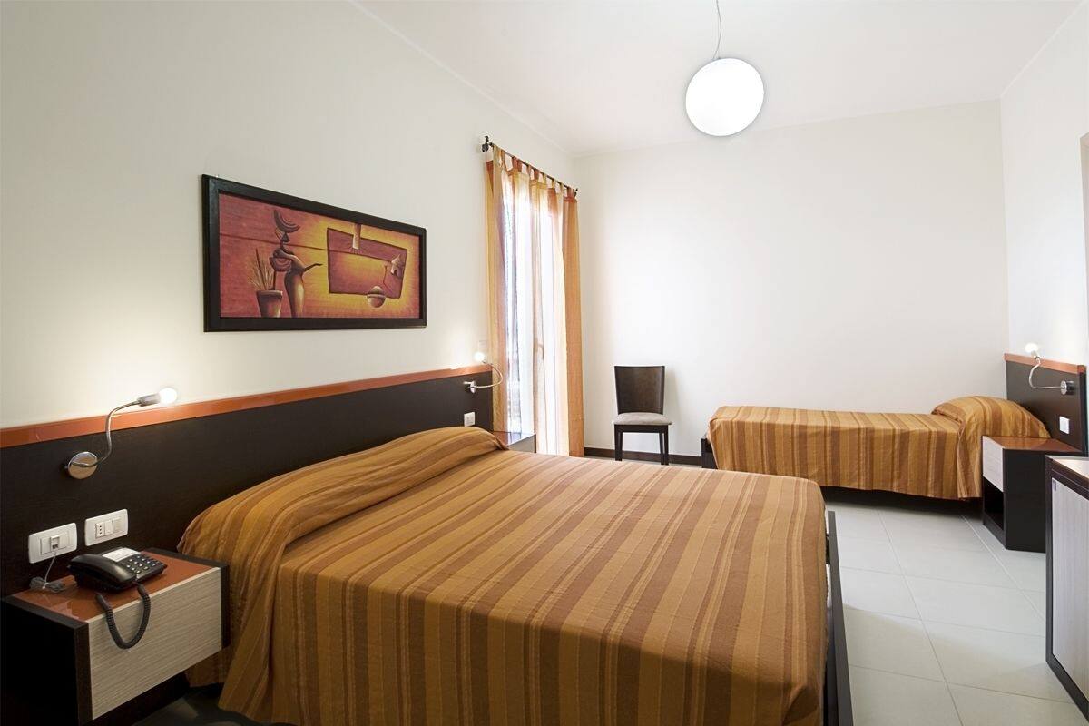 Triple Room | Minibar, in-room safe, desk, cribs (free)