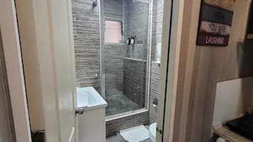 Charming room in an excellent location | Bathroom | Shower, hair dryer, towels, soap