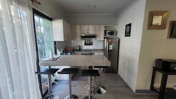 Cozy renovated apartment in great location | Private kitchen | Microwave, stovetop, toaster, spices