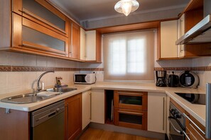 Fridge, microwave, oven, dishwasher